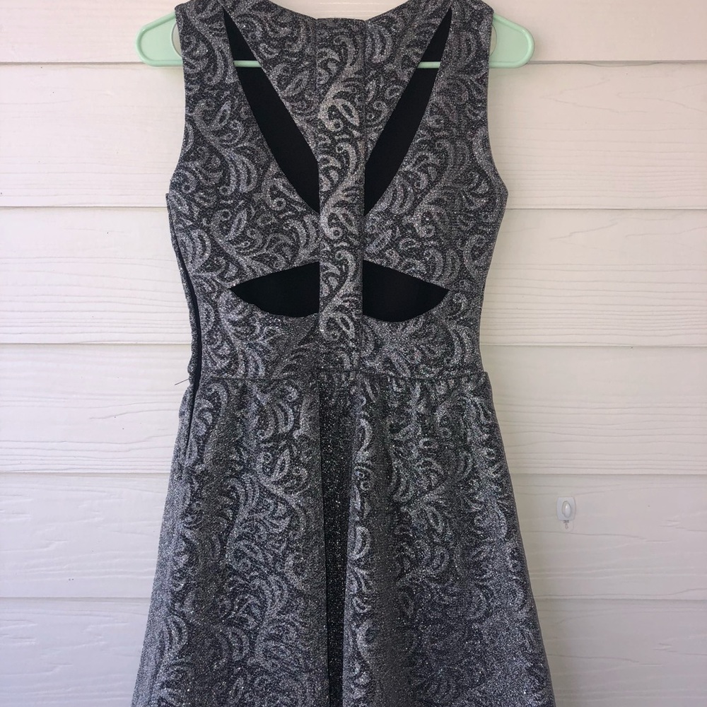 Beautiful and sparkly cut out skater dress